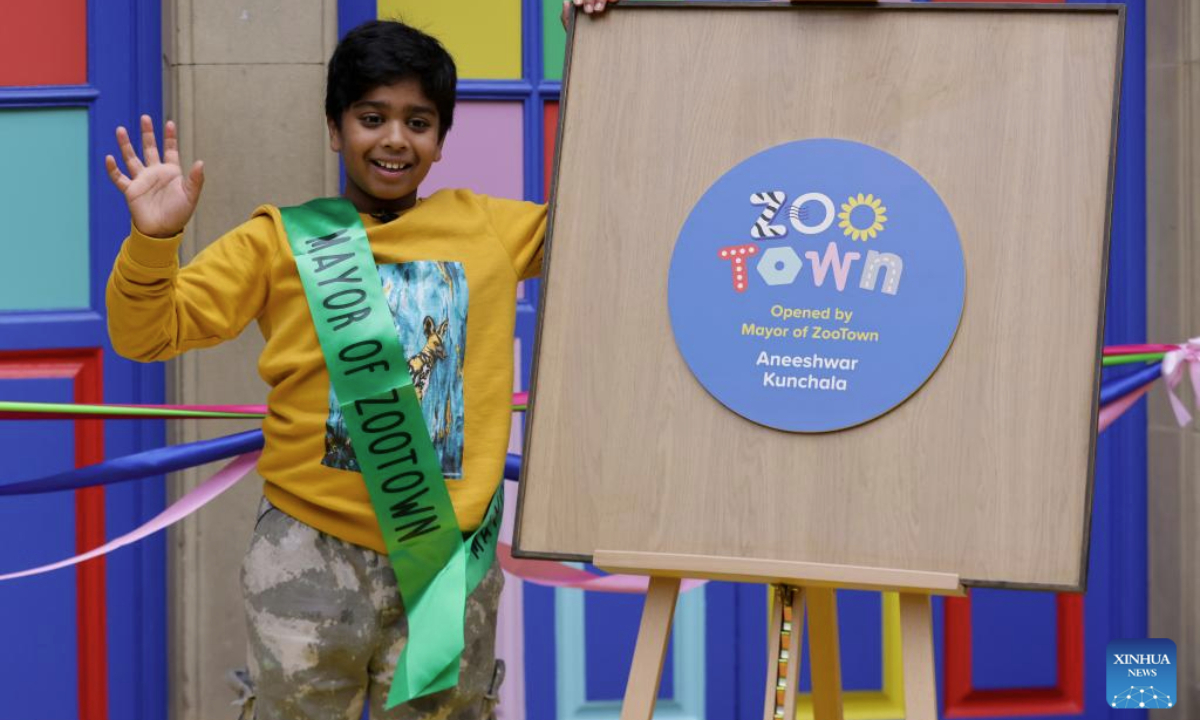 Aneeshwar Kunchala, 10-year-old conservationist and Mayor of ZooTown, patrols in an area of ZooTown at London Zoo in London, Oct. 15, 2025.
Opening to the public on Oct. 18, the ZooTown features multiple themed role-play stations where children can try their hands at working for wildlife, including preparing meals for animals in the Keeper Kitchen, fighting germs in the science lab or tracking wild animals in the field conservation station. (Xinhua)