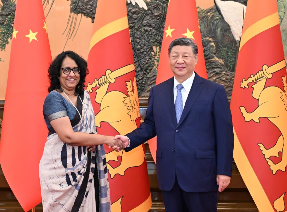 Chinese President Xi Jinping meets with Sri Lankan Prime Minister Harini Amarasuriya, who is in Beijing for the Global Leaders' Meeting on Women, at the Great Hall of the People in Beijing, capital of China, Oct. 14, 2025. (Xinhua/Li Xiang)