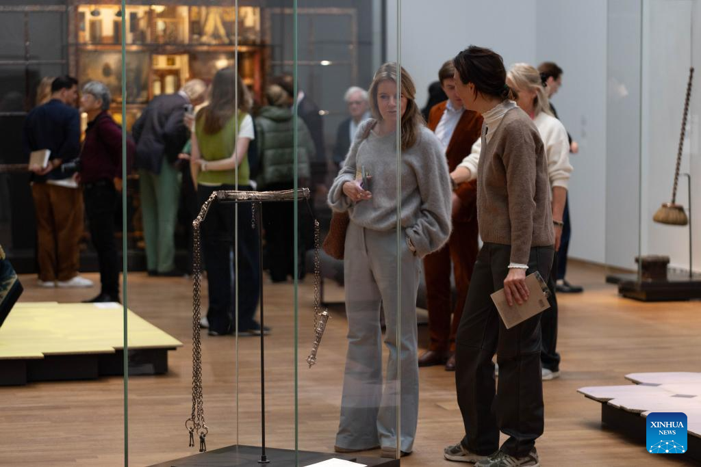 Visitors view exhibits during the media preview of the exhibition At Home in the 17th Century at the Rijksmuseum in Amsterdam, the Netherlands, Oct. 14, 2025. The exhibition, which showcases the lives of people in the Netherlands in the 17th century, will be open to the public from Oct. 17, 2025 to Jan. 11, 2026. (Photo by Sylvia Lederer/Xinhua)