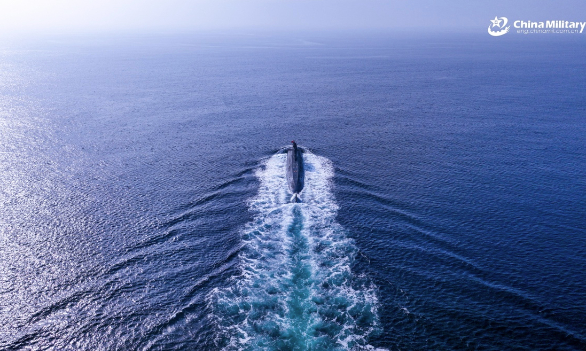 A submarine attached to a flotilla under the Chinese PLA Navy steams towards the designated area during a combat training exercise on September 25, 2025. (eng.chinamil.com.cn/Photo by Zhang Nan)