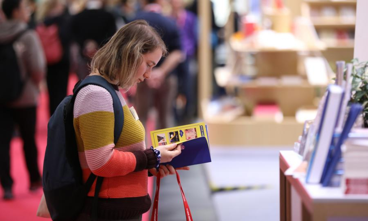 A woman visits the Frankfurt Book Fair in Frankfurt, Germany, Oct. 16, 2025. (Xinhua/Du Zheyu)