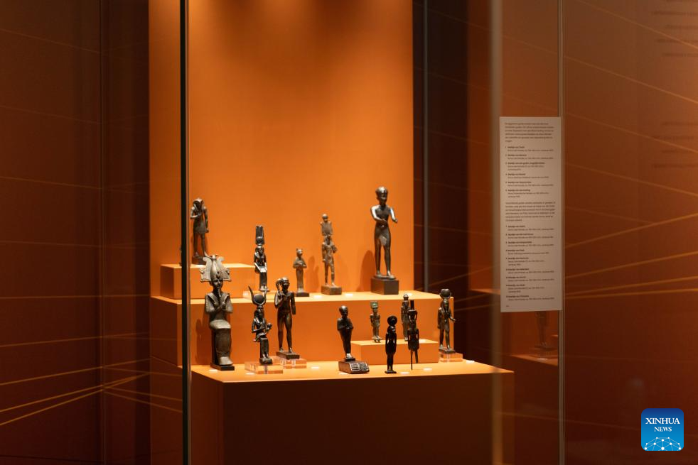 Artifacts are displayed during the media preview of the exhibition Discovering Ancient Egypt at the Rijksmuseum van Oudheden in Leiden, the Netherlands, Oct. 15, 2025. The exhibition, opening to the public on Thursday, showcases the life of ancient Egypt through 500 carefully curated artifacts. It will run until March 15, 2026. (Photo by Sylvia Lederer/Xinhua)