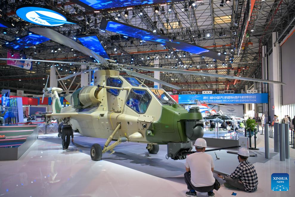 Exhibitors prepare for the upcoming 7th China Helicopter Exposition in Tianjin, north China, Oct. 14, 2025. The expo is scheduled to be held from Oct. 16 to 19 in Tianjin. (Xinhua/Sun Fanyue)