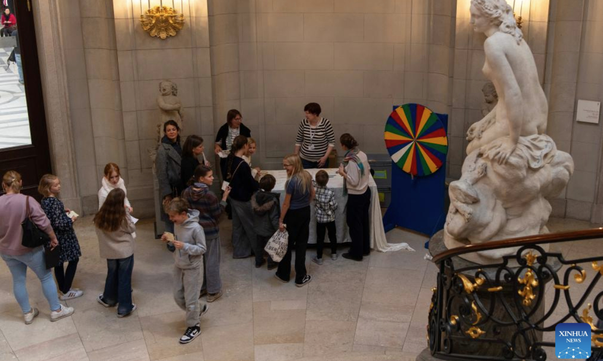 Visitors take part in a quiz and wheel of fortune activity at the Bode Museum in Berlin, Germany, Oct. 18, 2025.

A wide range of activities for families were held to celebrate the 121st anniversary of the opening of the Bode Museum on Saturday. (Xinhua/Zhang Haofu)