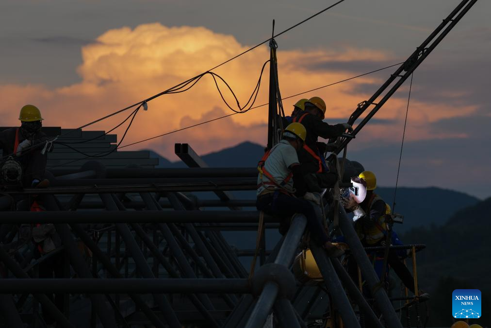 People work at the construction site of a station of the Quzhou-Lishui railway in Lishui, east China's Zhejiang Province, Oct. 14, 2025. The 160-km rail line will further improve the regional railway network, effectively promote tourism development in southwestern Zhejiang. (Xinhua/Huang Zongzhi)
