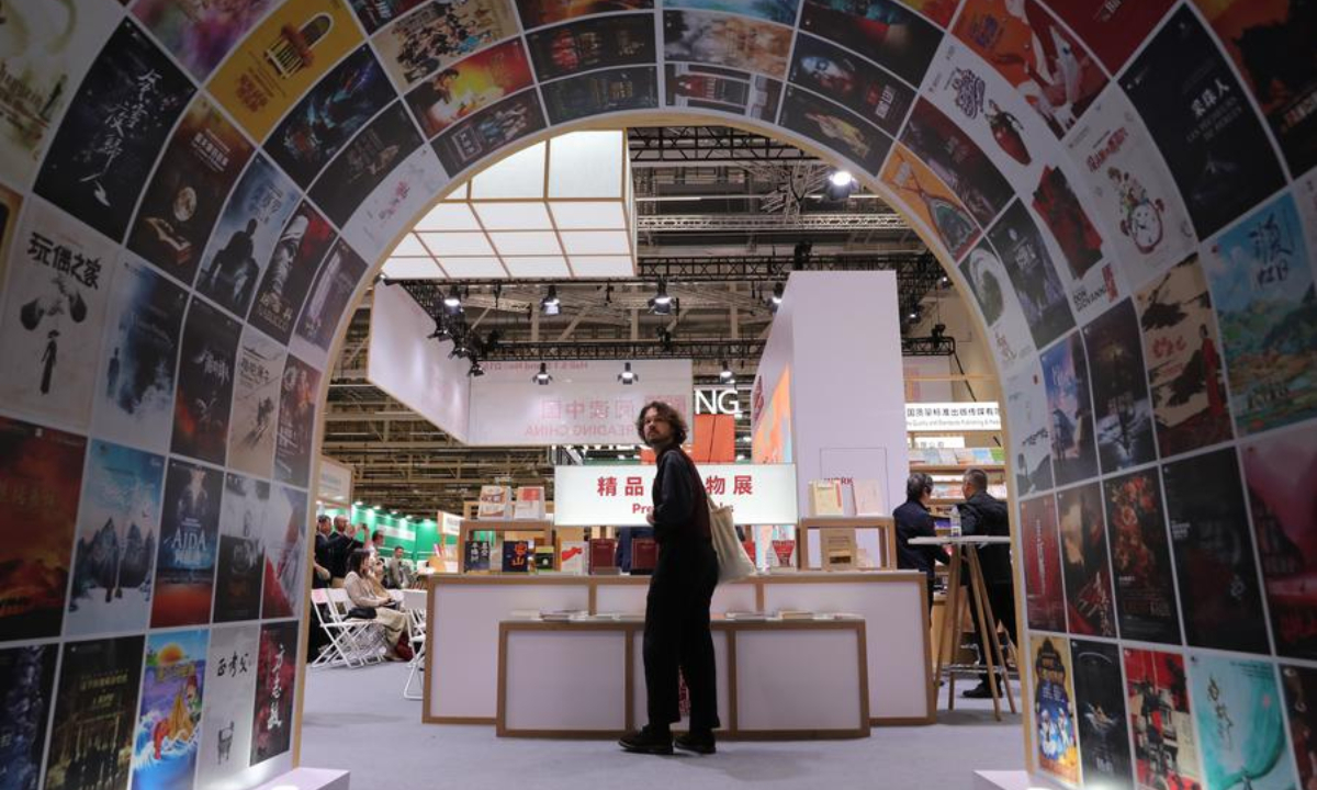 A man visits the Reading China booth at the Frankfurt Book Fair in Frankfurt, Germany, Oct. 15, 2025. (Xinhua/Du Zheyu)