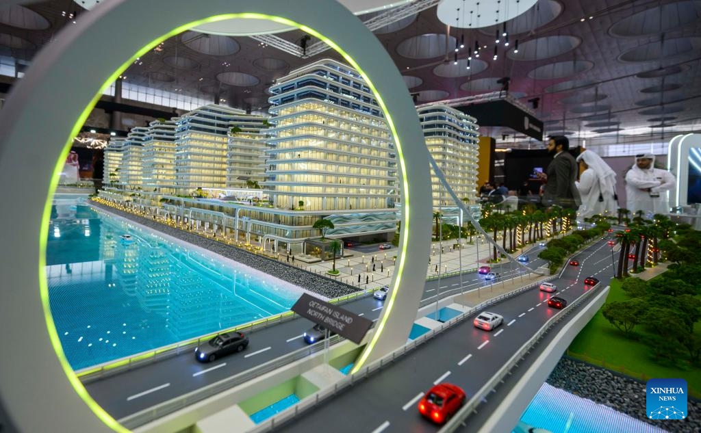 People visit the 13th edition of Cityscape Real Estate Exhibition at Doha Exhibition and Convention Center in Doha, Qatar, Oct. 12, 2025. Running from Oct. 12 to 14, the exhibition showcases groundbreaking projects and offers attendees the chance to engage with top developers. (Photo: Xinhua)