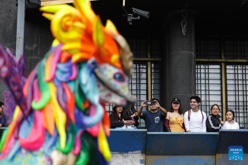 An alebrije is seen during the Monumental Alebrijes Parade 2025 in Mexico City, Mexico, Oct. 18, 2025.
Alebrijes are brightly colored folk art sculptures of fantastical creatures. (Photo by Francisco Canedo/Xinhua)