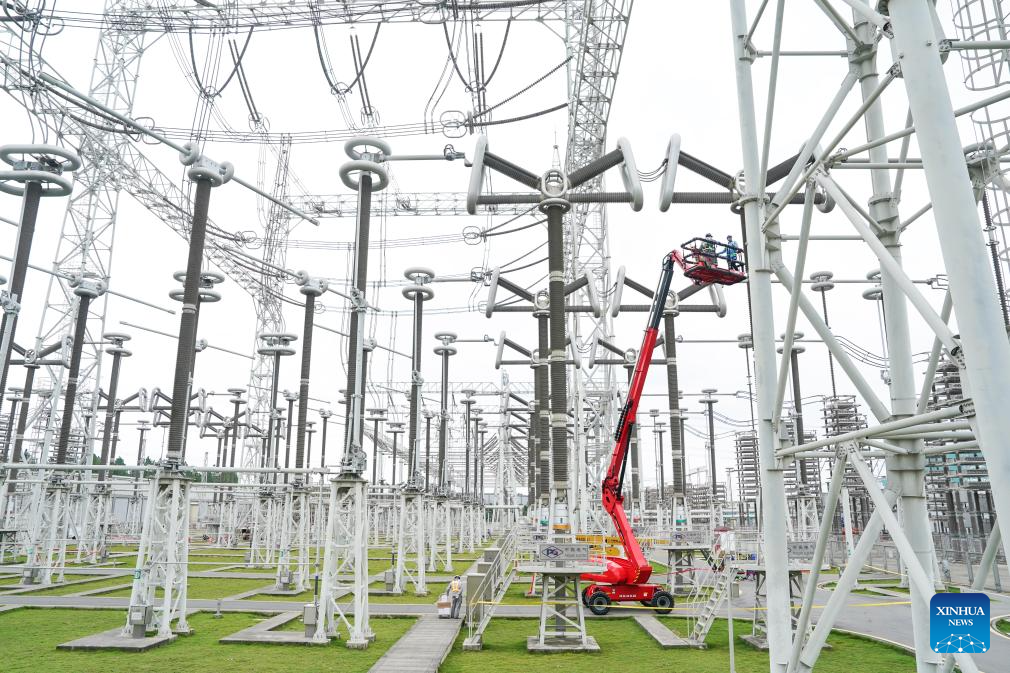 Staff members conduct maintenance work at the Guquan converter station in Xuancheng, east China's Anhui Province, Oct. 20, 2025. The Guquan converter station on the Changji-Guquan ultra-high voltage direct current (UHVDC) transmission line that transmits electricity from Xinjiang to east China is undergoing a 7-day annual overhaul started from Oct. 17.

The Changji-Guquan transmission line, which was put into operation in September 2019, leads the world in terms of voltage level, transmission capacity and distance. (Xinhua/Du Yu)