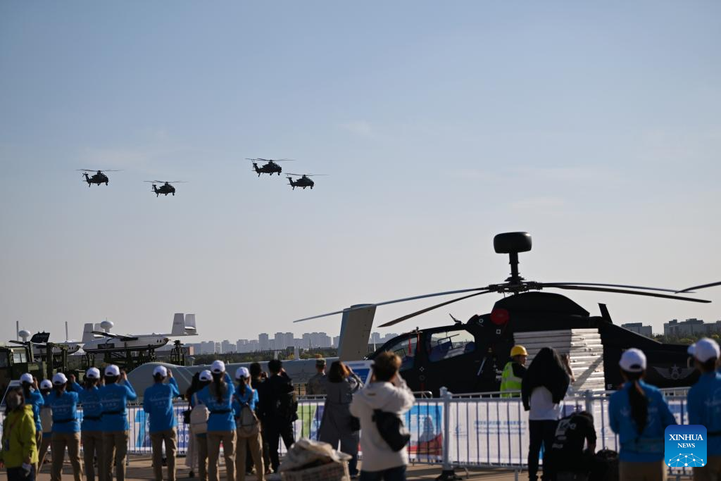 Helicopters rehearse for the upcoming 7th China Helicopter Exposition in Tianjin, north China, Oct. 14, 2025. The expo is scheduled to be held from Oct. 16 to 19 in Tianjin. (Xinhua/Li Ran)