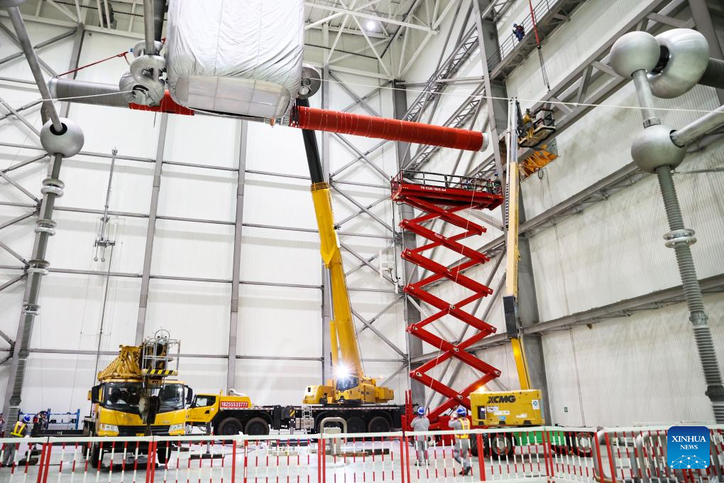 Staff members conduct maintenance work at the Guquan converter station in Xuancheng, east China's Anhui Province, Oct. 19, 2025. The Guquan converter station on the Changji-Guquan ultra-high voltage direct current (UHVDC) transmission line that transmits electricity from Xinjiang to east China is undergoing a 7-day annual overhaul started from Oct. 17.

The Changji-Guquan transmission line, which was put into operation in September 2019, leads the world in terms of voltage level, transmission capacity and distance. (Photo by Zhao Xianfu/Xinhua)