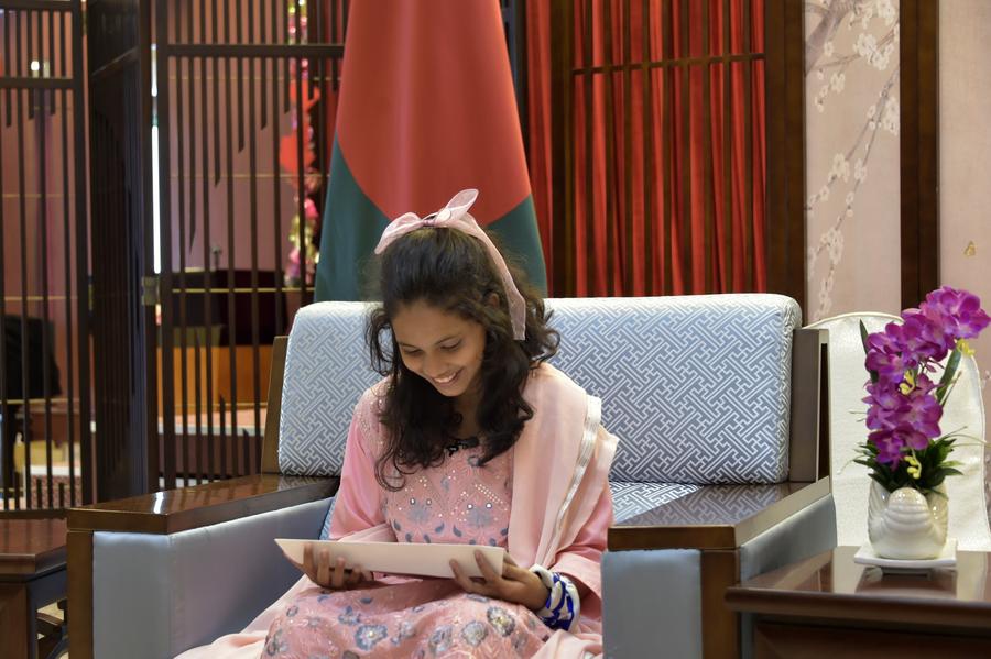 Alifa Chin reads a reply letter from Chinese President Xi Jinping in Dhaka, Bangladesh, on May 29, 2023. (Photo: Xinhua)