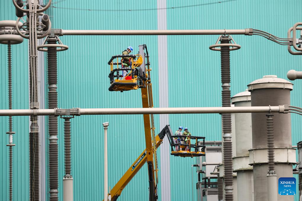 Staff members conduct maintenance work at the Guquan converter station in Xuancheng, east China's Anhui Province, Oct. 20, 2025. The Guquan converter station on the Changji-Guquan ultra-high voltage direct current (UHVDC) transmission line that transmits electricity from Xinjiang to east China is undergoing a 7-day annual overhaul started from Oct. 17.

The Changji-Guquan transmission line, which was put into operation in September 2019, leads the world in terms of voltage level, transmission capacity and distance. (Photo by Zhao Xianfu/Xinhua)