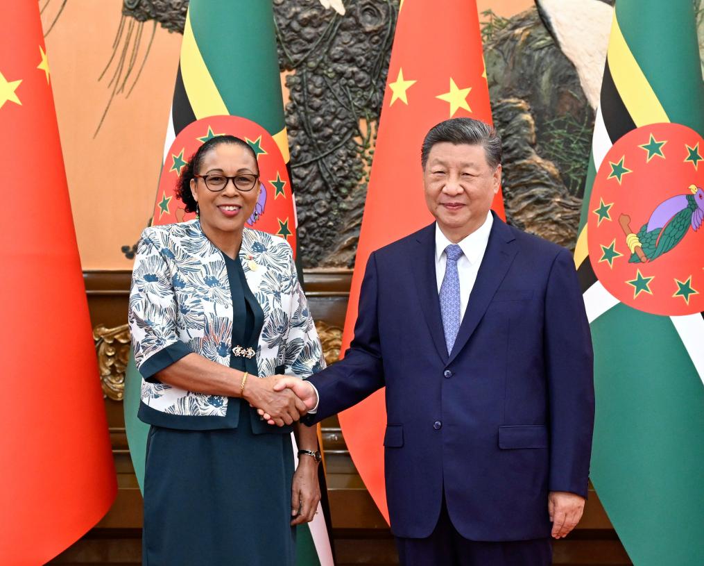 Chinese President Xi Jinping meets with Sylvanie Burton, president of the Commonwealth of Dominica, who is in Beijing for the Global Leaders' Meeting on Women, at the Great Hall of the People in Beijing, capital of China, Oct. 14, 2025. (Xinhua/Shen Hong)