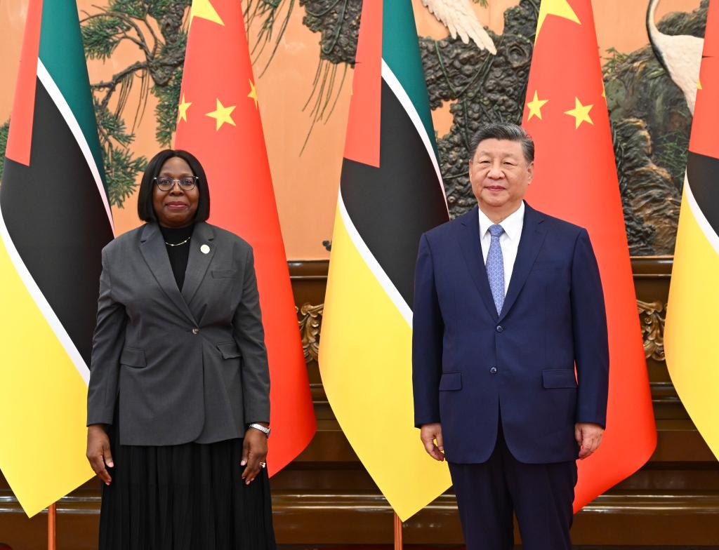Chinese President Xi Jinping meets with Prime Minister of Mozambique Maria Benvinda Delfina Levi, who is in Beijing for the Global Leaders' Meeting on Women, at the Great Hall of the People in Beijing, capital of China, Oct. 14, 2025. (Xinhua/Zhai Jianlan)