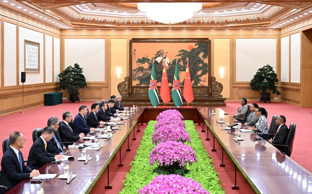 Chinese President Xi Jinping meets with Sylvanie Burton, president of the Commonwealth of Dominica, who is in Beijing for the Global Leaders' Meeting on Women, at the Great Hall of the People in Beijing, capital of China, Oct. 14, 2025. (Xinhua/Li Xiang)