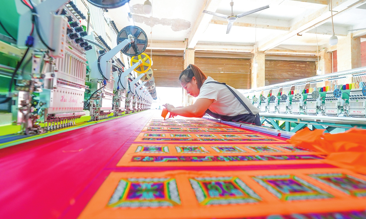 Developing embroidery

An employee uses computer numerical control machine tools to produce ethnic embroidery products at a workshop in Rongjiang county, Southwest China's Guizhou Province on October 16, 2025. The local government is making efforts to support and develop its embroidery industry by providing training and job opportunities for locals.  Photo: VCG