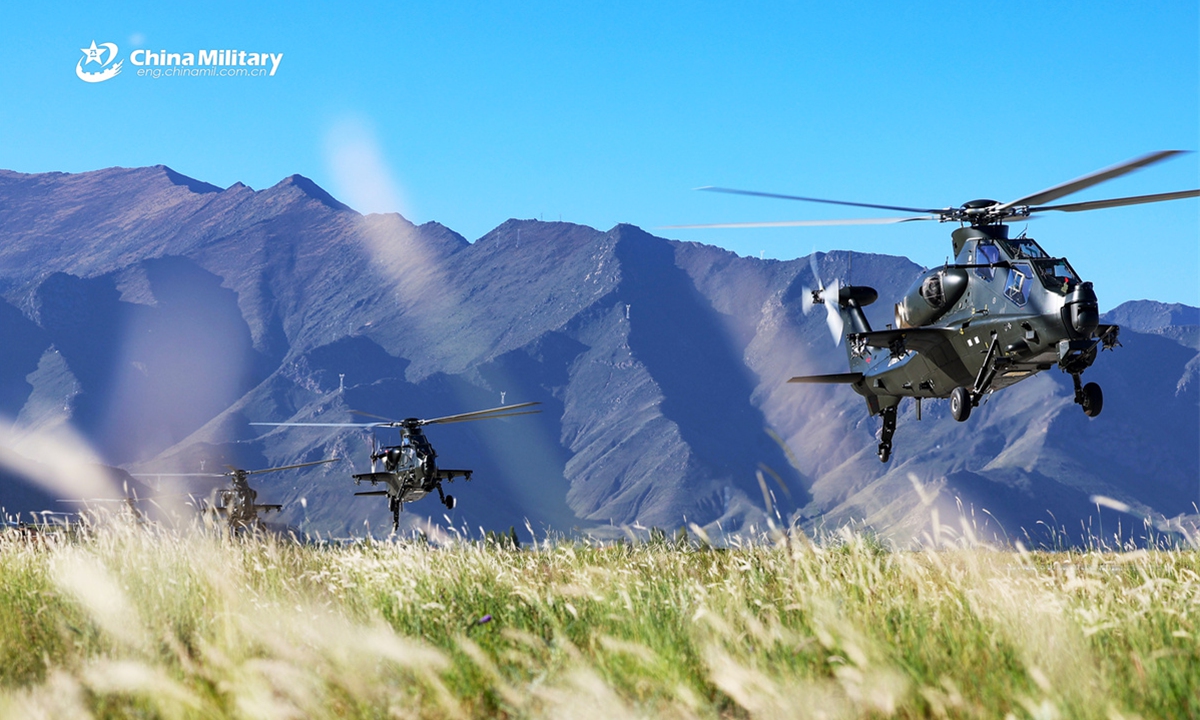 A group of Z-10 attack helicopters attached to a brigade under the Chinese PLA Xizang Military Command lift off successively during a flight training exercise on October 3, 2025. Z-10 attack helicopter is China's first self-developed dedicated attack helicopter, possessing robust capabilities in ground attack and air-to-air combat against other helicopters. (eng.chinamil.com.cn/Photo by Hu Qiwu)