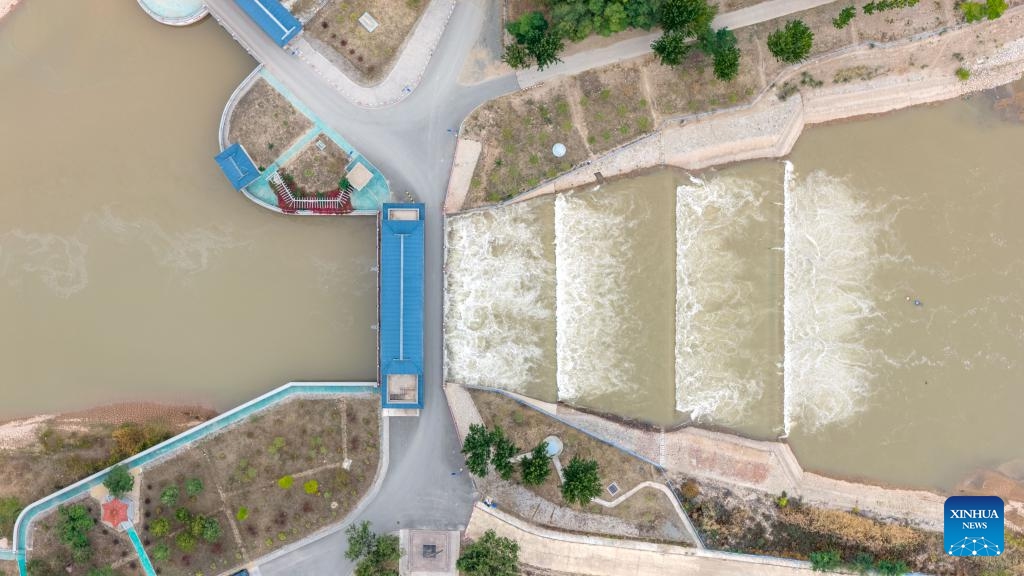 An aerial drone photo taken on Oct. 16, 2025 shows a water diversion hub in Linhe District of Bayannur, north China's Inner Mongolia Autonomous Region. The Hetao Irrigation Area, located in Bayannur, has been diverting water from the Yellow River for irrigate since the Qin Dynasty (221 B.C.-207 B.C.). A seasonal irrigation is underway in the area to preserve soil moisture for spring farming in the next year. (Xinhua/Ma Jinrui)