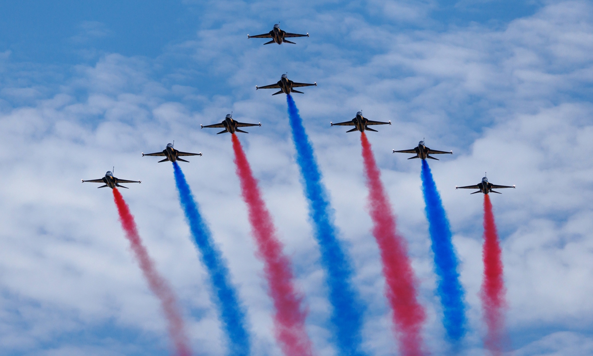 The South Korean Air Force Black Eagles aerobatics team performs maneuvers in South Korean T-50 jets, during the Seoul International Aerospace & Defense Exhibition at Seoul Air Base in Seongnam, South Korea, on October 17, 2025.