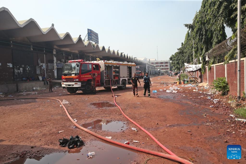This photo taken on Oct. 19, 2025 shows a fire fighting truck at Hazrat Shahjalal International Airport after a fire in Dhaka, Bangladesh. The devastating fire at the cargo village of Hazrat Shahjalal International Airport led to around 21 flights being either diverted or cancelled, according to Sheikh Bashir Uddin, adviser to the Bangladeshi Ministry of Civil Aviation and Tourism. The adviser said that the airport had successfully met its goal of resuming operations by 9 p.m. local time on Saturday night after the fire erupted at around 2:15 p.m. local time on Saturday. (Photo: Xinhua)
