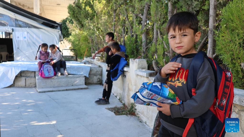 Children have a break at a temporary learning center in Salma, Latakia province, Syria, Oct. 13, 2025. (Photo: Xinhua)