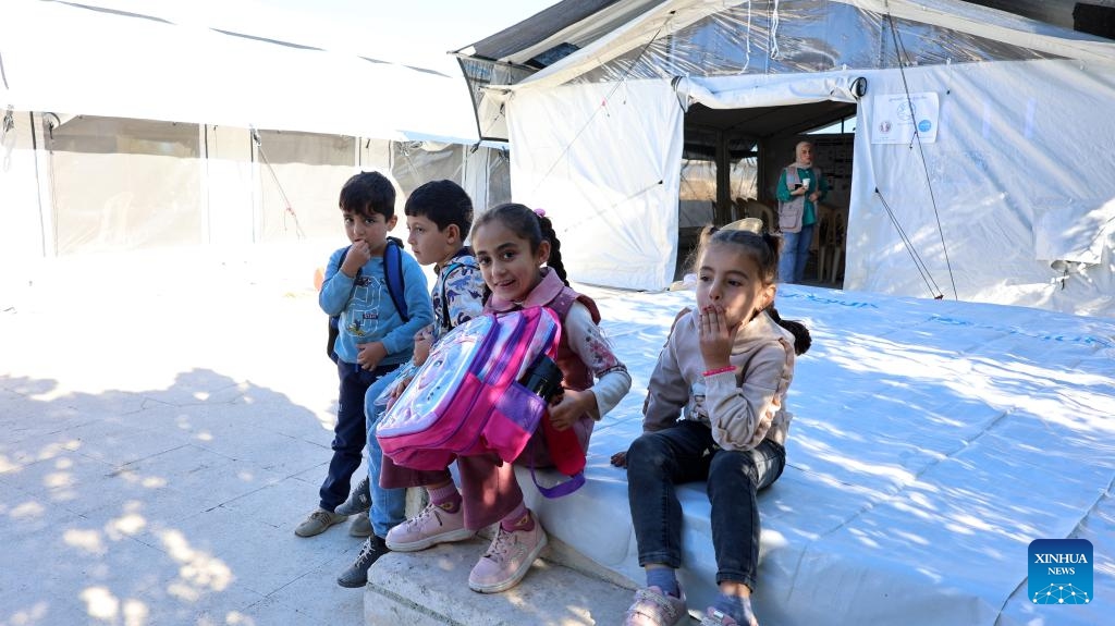 Children have a break at a temporary learning center in Salma, Latakia province, Syria, Oct. 13, 2025. (Photo: Xinhua)