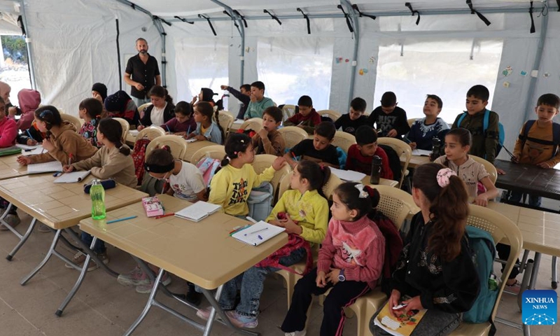 Children take a class at a temporary learning center in Salma, Latakia province, Syria, Oct. 13, 2025. (Photo: Xinhua)