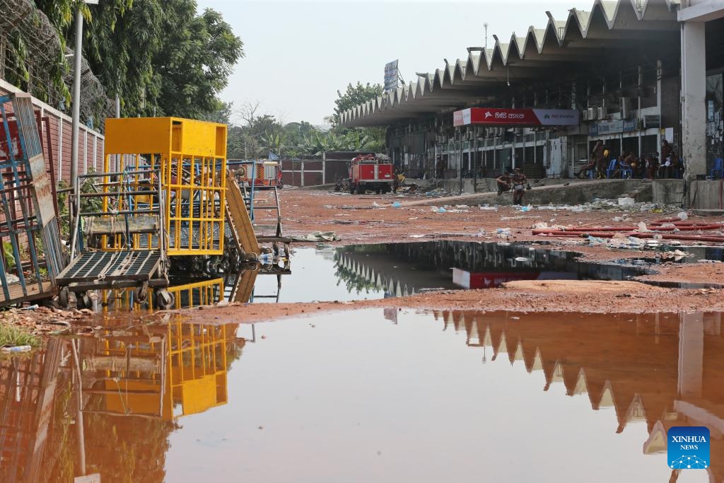 This photo taken on Oct. 19, 2025 shows the cargo village of Hazrat Shahjalal International Airport after a fire in Dhaka, Bangladesh. The devastating fire at the cargo village of Hazrat Shahjalal International Airport led to around 21 flights being either diverted or cancelled, according to Sheikh Bashir Uddin, adviser to the Bangladeshi Ministry of Civil Aviation and Tourism. The adviser said that the airport had successfully met its goal of resuming operations by 9 p.m. local time on Saturday night after the fire erupted at around 2:15 p.m. local time on Saturday. (Photo: Xinhua)