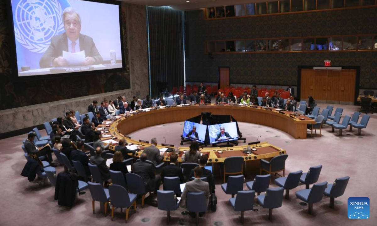 UN Secretary-General Antonio Guterres (on screens) speaks via a video link at an open debate of the Security Council on the future of the UN at the UN headquarters in New York, Oct. 24, 2025. Guterres called on the Security Council to channel the resources often spent on war to development and peace on Friday. (Xinhua/Xie E)