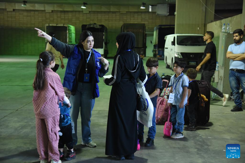 The sixth voluntary batch of displaced Syrians return to Syria via the Al-Arida crossing in Tripoli, Lebanon, on Oct. 23, 2025. (Photo by Khaled Habashiti/Xinhua)