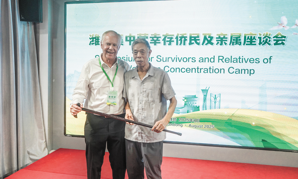Han Chongbin presents Charles Stanley with a handcrafted inlaid gift during their meeting at the international forum in Weifang, on August 17, 2025. Photos on this page: Courtesy of the Weihsien West Civilians Concentration Camp Site Museum
