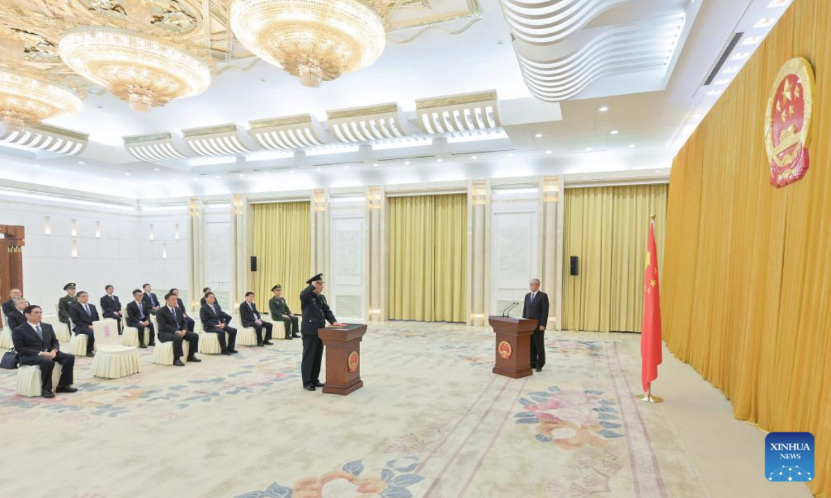 Li Hongzhong, vice chairman of the National People's Congress (NPC) Standing Committee, chairs and oversees an oath-taking ceremony held by the 14th NPC Standing Committee to pledge allegiance to the Constitution at the Great Hall of the People in Beijing, capital of China, Oct. 28, 2025. (Xinhua/Gao Jie)