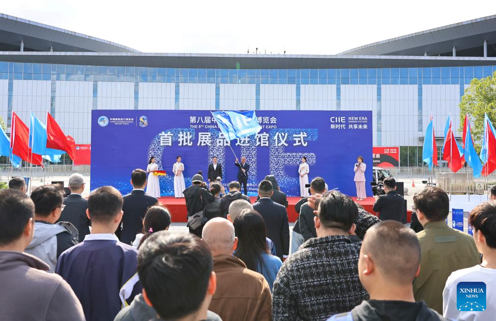 A ceremony marking the arrival of exhibits for the upcoming 8th China International Import Expo (CIIE) is held at the north square of the National Exhibition and Convention Center (Shanghai), the main venue for the CIIE, in east China's Shanghai, Oct. 23, 2025. The first batch of exhibits for the exhibition areas of Intelligent Industry and Information Technology, Food and Agricultural Products, and Medical Equipment & Healthcare Products of the 8th CIIE arrived at the National Exhibition and Convention Center (Shanghai) on Thursday. (Xinhua/Fang Zhe)