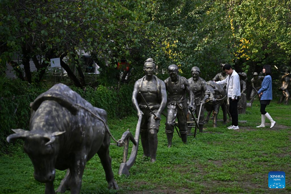 Tourists learn about ancient Chinese agriculture at the Northwest A&F University Exposition Park in Yangling, northwest China's Shaanxi Province, Oct. 26, 2025. (Xinhua/Li Yibo)