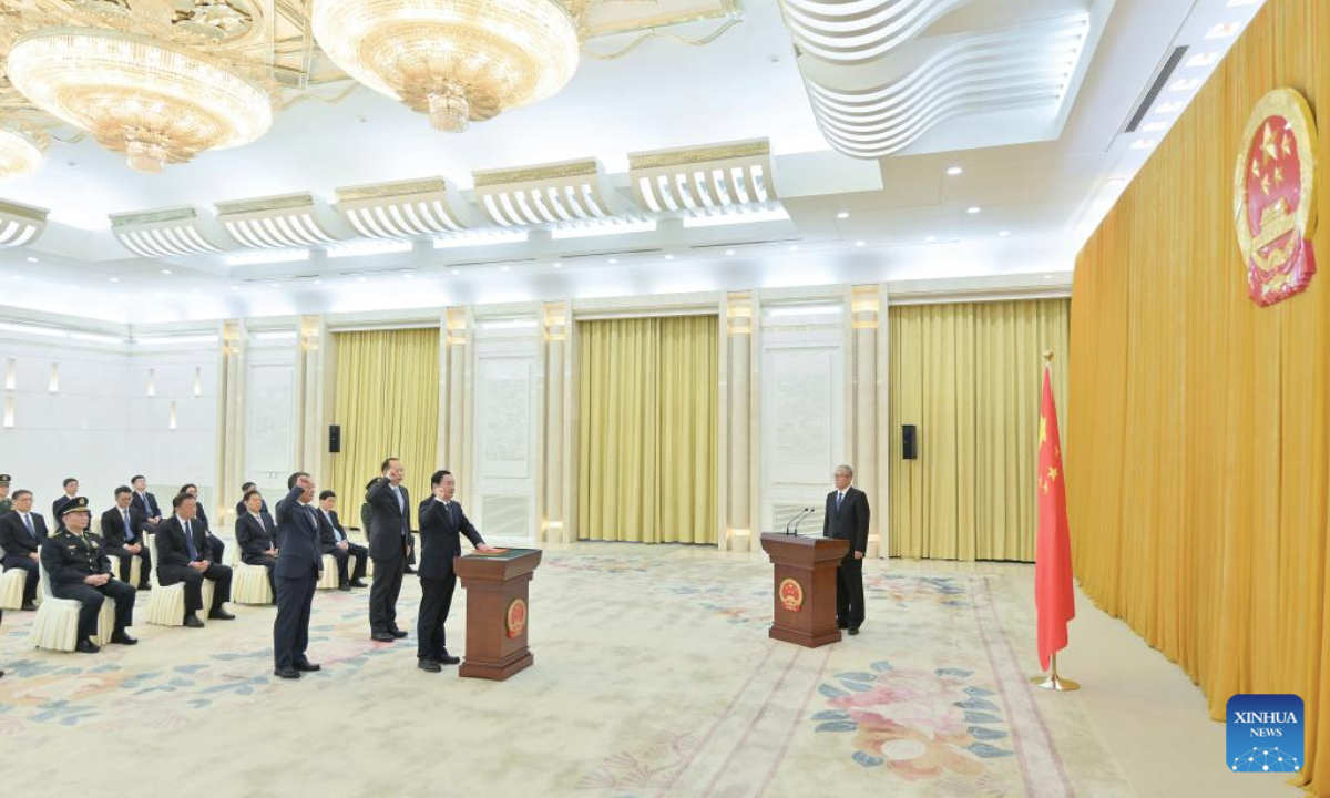 Li Hongzhong, vice chairman of the National People's Congress (NPC) Standing Committee, chairs and oversees an oath-taking ceremony held by the 14th NPC Standing Committee to pledge allegiance to the Constitution at the Great Hall of the People in Beijing, capital of China, Oct. 28, 2025. (Xinhua/Gao Jie)