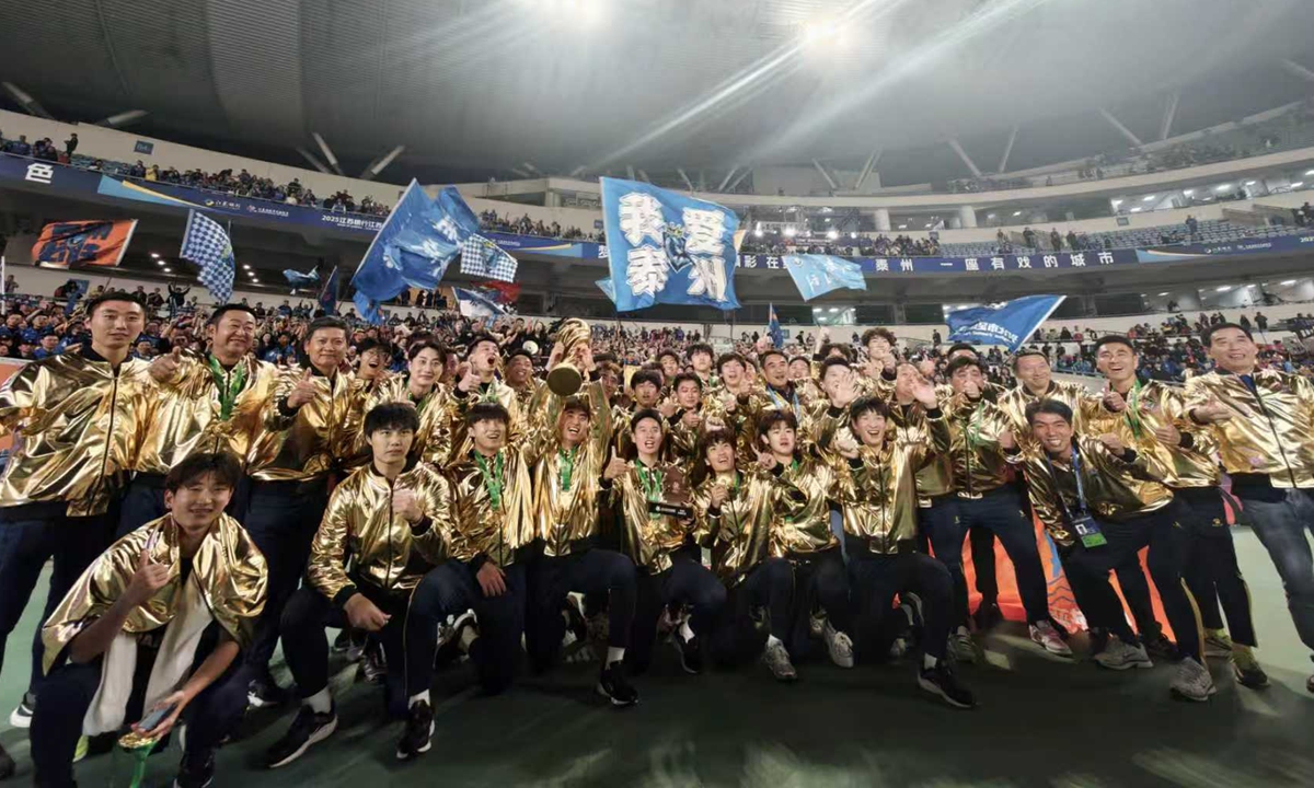 Taizhou players celebrate after winning the maiden 