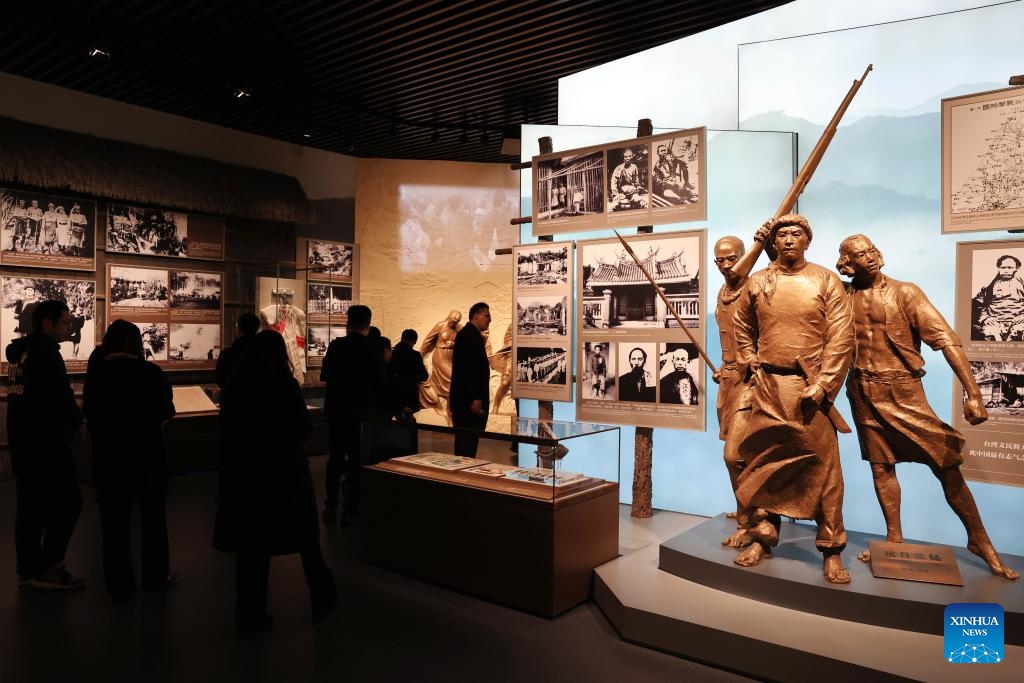 People visit Unyielding Treasure Island: Loyal to the Motherland, an exhibition on the history of Taiwan compatriots' resistance against Japanese aggression, at the Museum of the War of Chinese People's Resistance Against Japanese Aggression in Beijing, capital of China, Oct. 25, 2025. Featuring 387 archive photographs and 453 cultural relics, the exhibition opened here on Saturday to commemorate the 80th anniversary of Taiwan's restoration to China. (Photo: Xinhua)