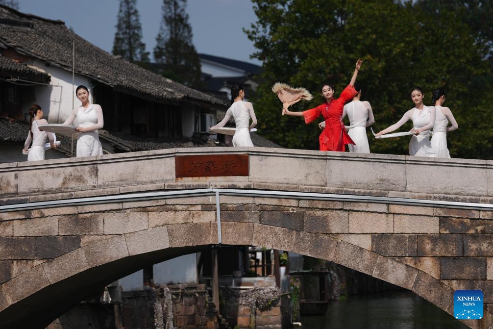 Dancers perform during a dance festival in the ancient town of Xinshi of Deqing County, east China's Zhejiang Province, on Oct. 24, 2025. (Photo: Xinhua)