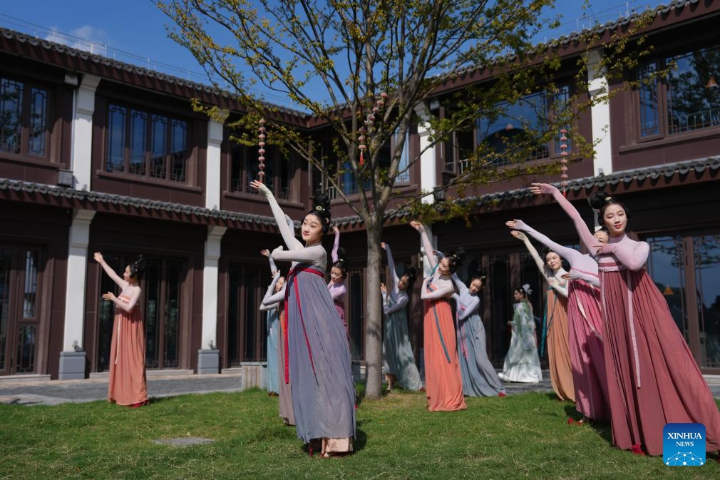 Dancers perform during a dance festival in the ancient town of Xinshi of Deqing County, east China's Zhejiang Province, on Oct. 24, 2025. (Photo: Xinhua)