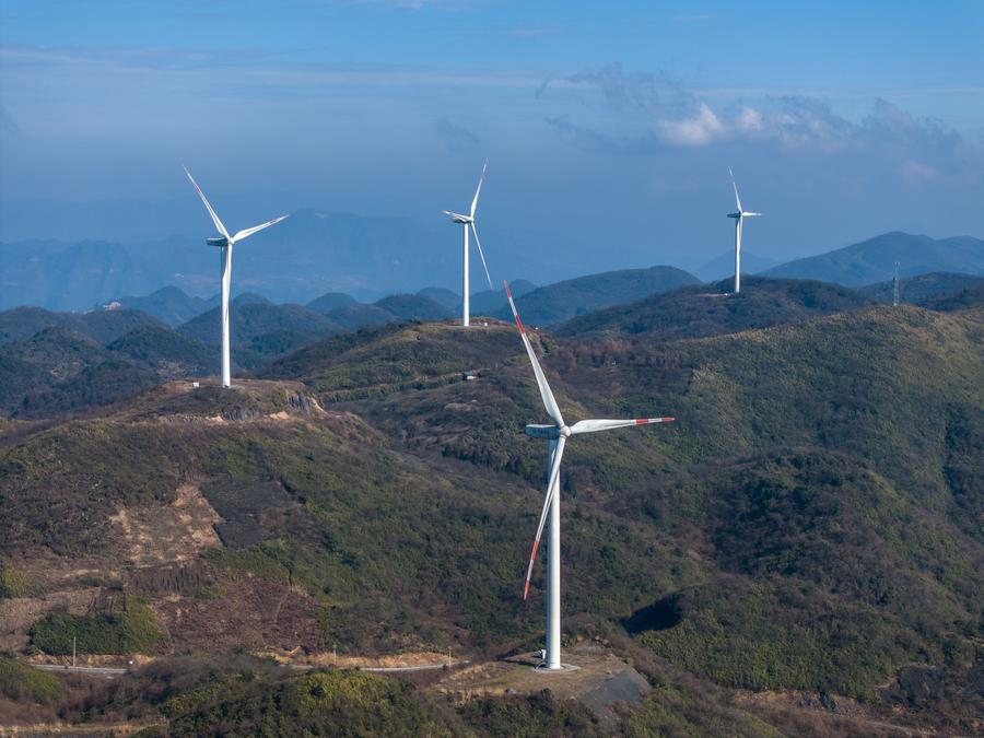 An aerial drone photo taken on Jan. 10, 2024 shows wind turbines in Liutang Township of Shizhu Tujia Autonomous County, southwest China's Chongqing. (Photo: Xinhua)