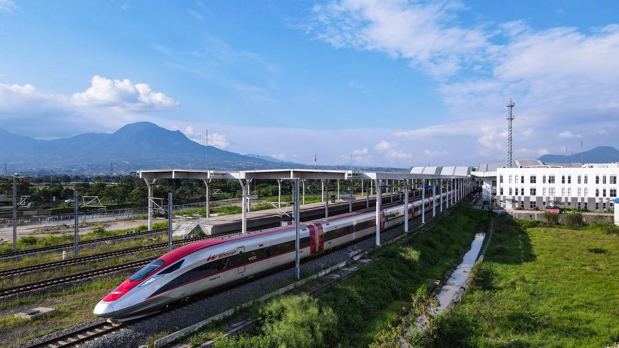 An aerial drone photo taken on May 20, 2025 shows a high-speed electrical multiple unit (EMU) train leaving Tegalluar Station of Jakarta-Bandung High-Speed Railway (HSR) in Bandung, Indonesia. (Photo: Xinhua)