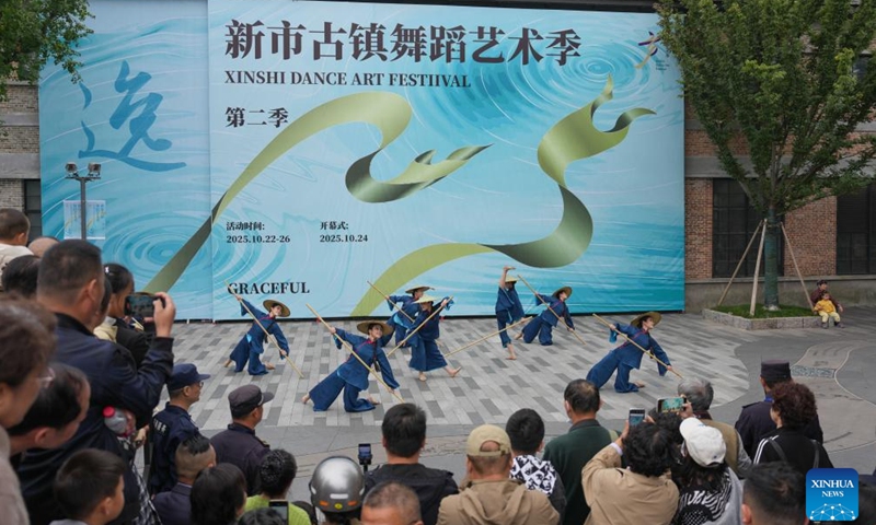 Dancers perform during a dance art festival in the ancient town of Xinshi of Deqing County, east China's Zhejiang Province, on Oct. 26, 2025. (Photo: Xinhua)