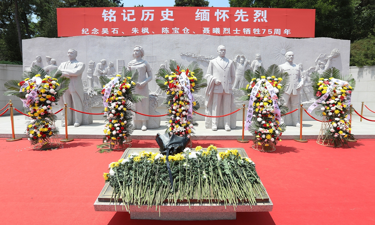 Flowers lie in tribute before the statues of martyrs Chen Baocang, Zhu Feng, Wu Shi and Nie Xi (from left to right) in Beijing on June 10, 2025. Photos on this page: VCG 