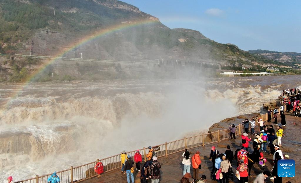 An aerial drone photo taken on Oct. 27, 2025 shows a rainbow over the Hukou Waterfall in Jixian County, north China's Shanxi Province. (Photo: Xinhua)