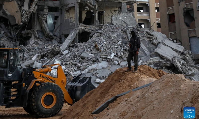 An Egyptian Excavator digs during searching for Israeli remains in the southern Gaza Strip city of Khan Younis, Oct. 26, 2025. Egypt has dispatched a specialized team and equipment to Gaza to assist in recovering the bodies of Israeli hostages held in the enclave, Egypt's Al-Qahera News reported Saturday. (Photo: Xinhua)