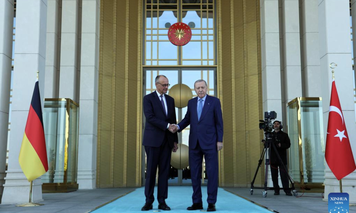 Turkish President Recep Tayyip Erdogan (R) shakes hands with visiting German Chancellor Friedrich Merz in Ankara, Türkiye, Oct. 30, 2025. (Mustafa Kaya/Handout via Xinhua)