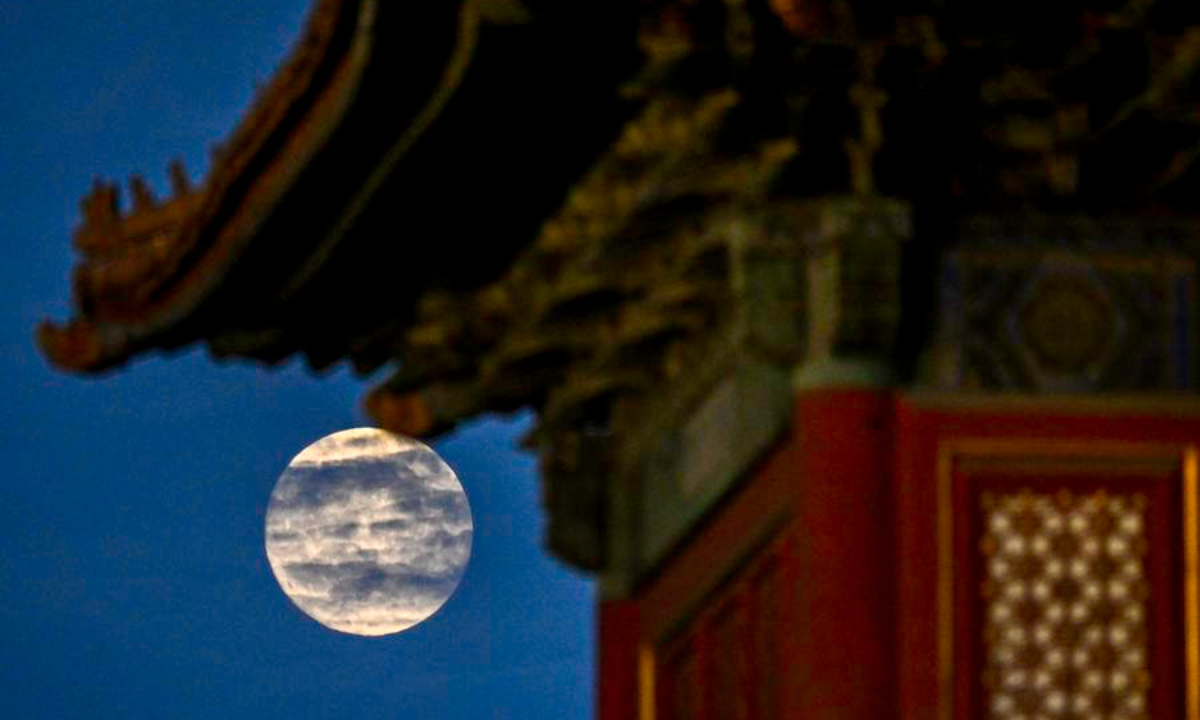 A full moon is pictured near the Palace Museum in Beijing, capital of China, Oct. 6, 2025. The date marks this year's Mid-Autumn Festival, which is celebrated annually on the 15th day of the eighth month in the Chinese lunar calendar. (Xinhua/Liu Jinhai)
