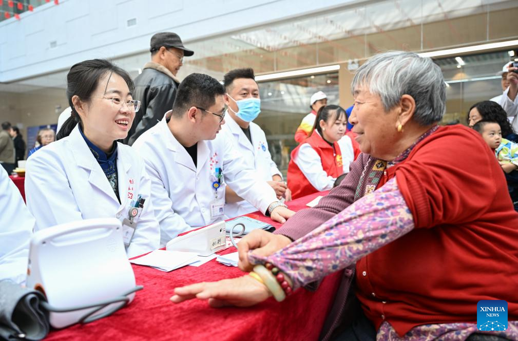 Medical staff participate in a free clinic event to mark the Chongyang Festival at a community in Erdos, north China's Inner Mongolia Autonomous Region, Oct. 29, 2025. The Double Ninth Festival, also known as the Chongyang Festival, celebrated on the ninth day of the ninth lunar month, falls on Wednesday this year. It is an occasion to care for and send blessings to older people in China. (Xinhua/Bei He)