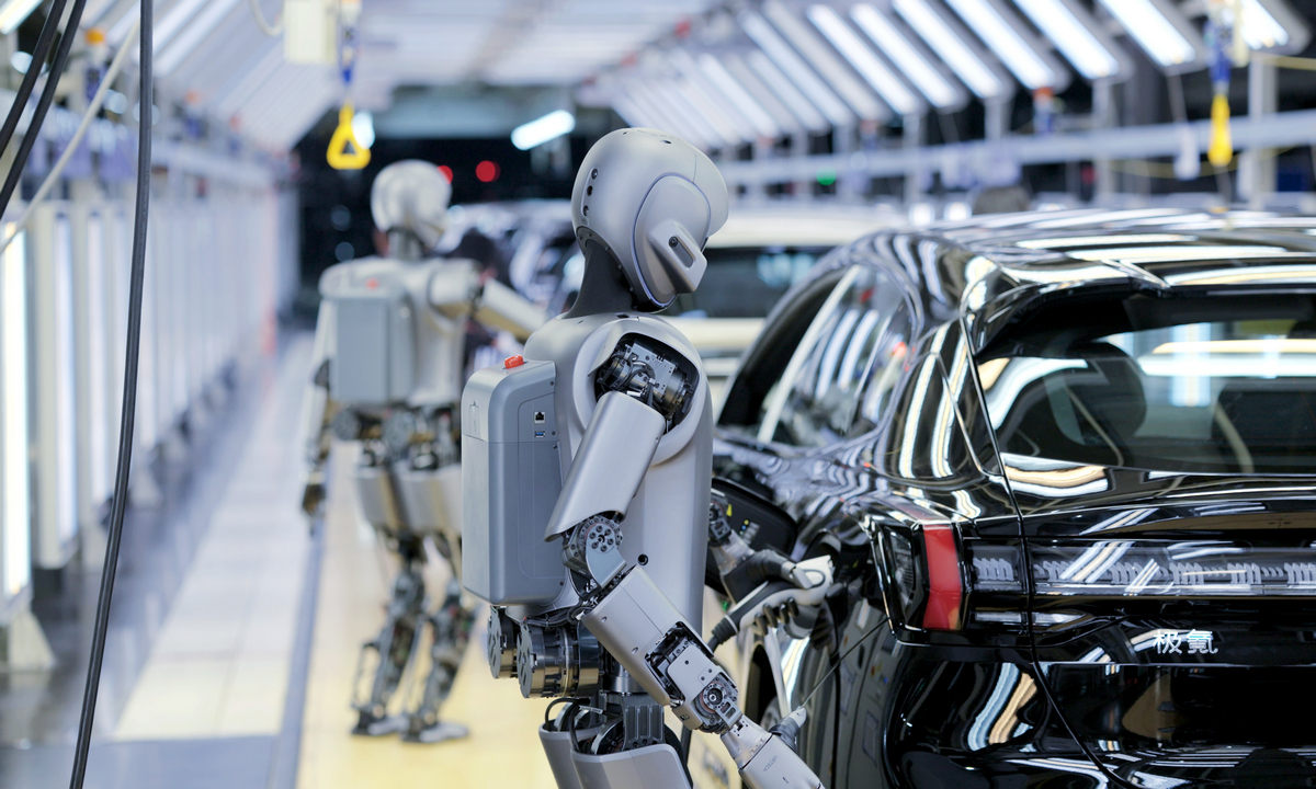 Dozens of UBTECH industrial humanoid robots carry out training tasks at a smart factory in the Qianwan New Area in Ningbo, East China's Zhejiang Province, on March 1, 2025. Photo: VCG